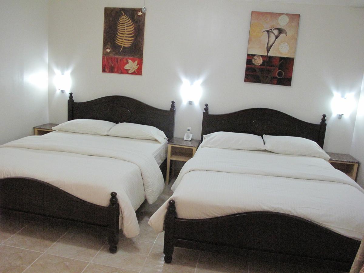 ماكاتي Makati Suites At Travelers Inn المظهر الخارجي الصورة