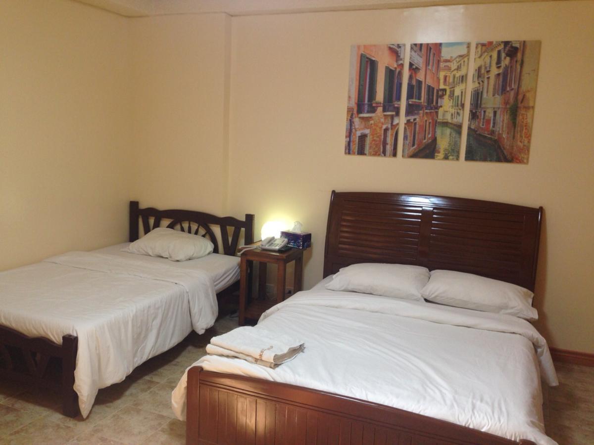 ماكاتي Makati Suites At Travelers Inn المظهر الخارجي الصورة